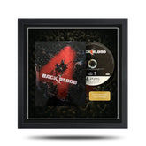 Framed 'Back 4 Blood' gaming disc with cover on a white background