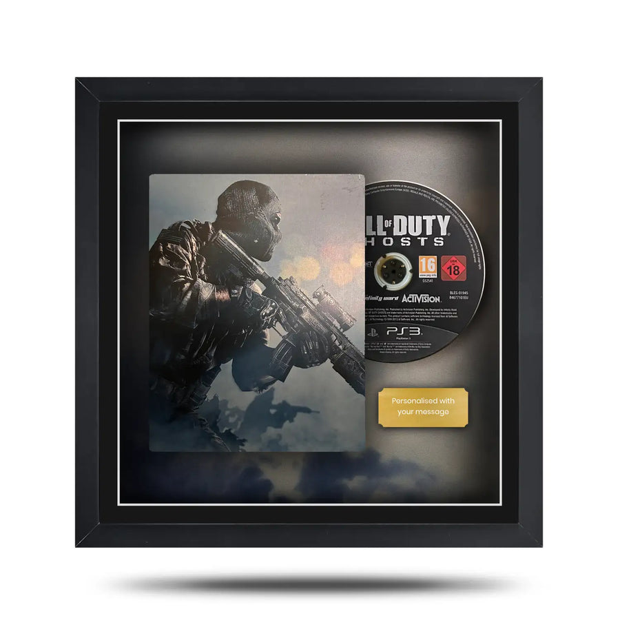 Framed 'Call of Duty: Ghosts' game disc with cover and certification label.