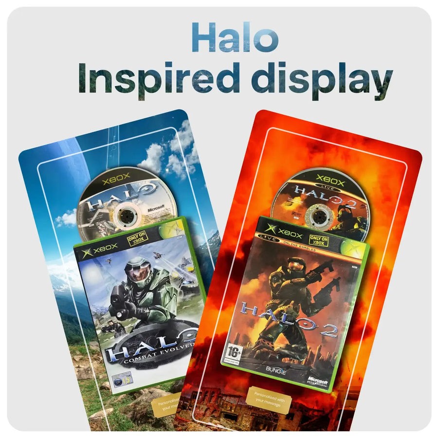 Two Halo-themed display plates featuring Xbox Halo game art, shown on a light gray background with the text 'Halo Inspired display' above them. The left card has a blue sky and mountain design with a green-armored character, and the right card has a fiery orange-red design with a dark-armored character.