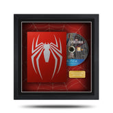 Framed Spider-Man game disc with red background and spider graphic