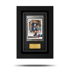 A Topps UEFA Club Competitions card displayed in a black frame with a clear protective cover. A Topps UEFA Club Competitions card displayed in a black frame with a clear protective cover.