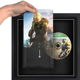 A person holding a Xbox Series X video games sliding it into a plastic protective case, in a frame.