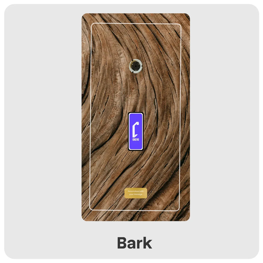 A rectangular wall plate featuring a realistic brown bark wood grain pattern, with a small blue call-style icon and the word 'Bark' below on a light gray background.