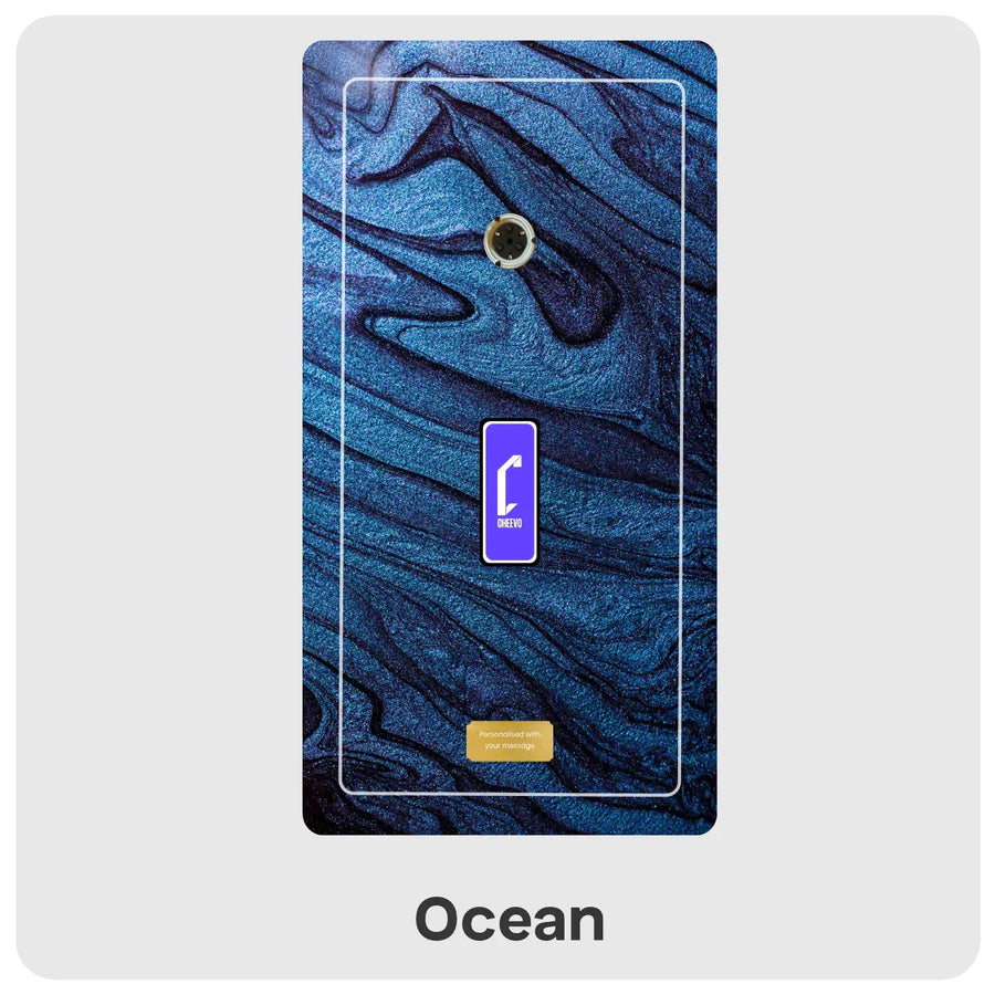 A dark blue and black marbled pattern, featuring a purple and white 'Cheevo' logo in the center and a small gold accent at the bottom, labeled 'Ocean' underneath.