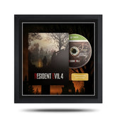 Framed 'Resident Evil 4' game cover with Xbox disc inside