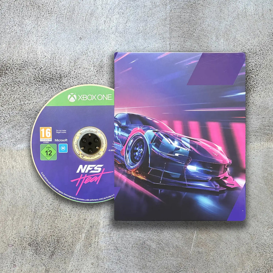 Game disc and cover for 'Need for Speed: Heat' on Xbox One on a textured surface