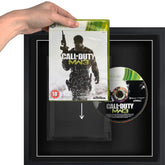 Plastic slipcase for xbox 60 video games. The game is being added to the case whilst the game disc sits in a frame