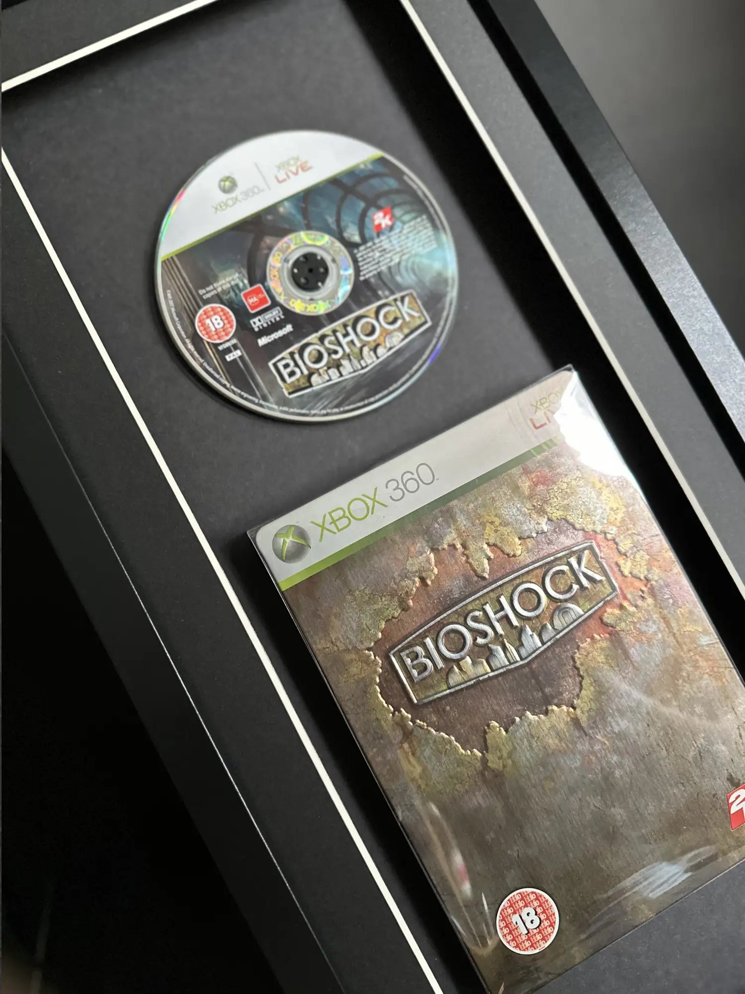 Bioshock Xbox 360 steelbook displayed inside a frame