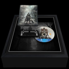 Game case and disc for 'Bloodborne' steelbook on a black backing with dark forest background, inside of a display frame