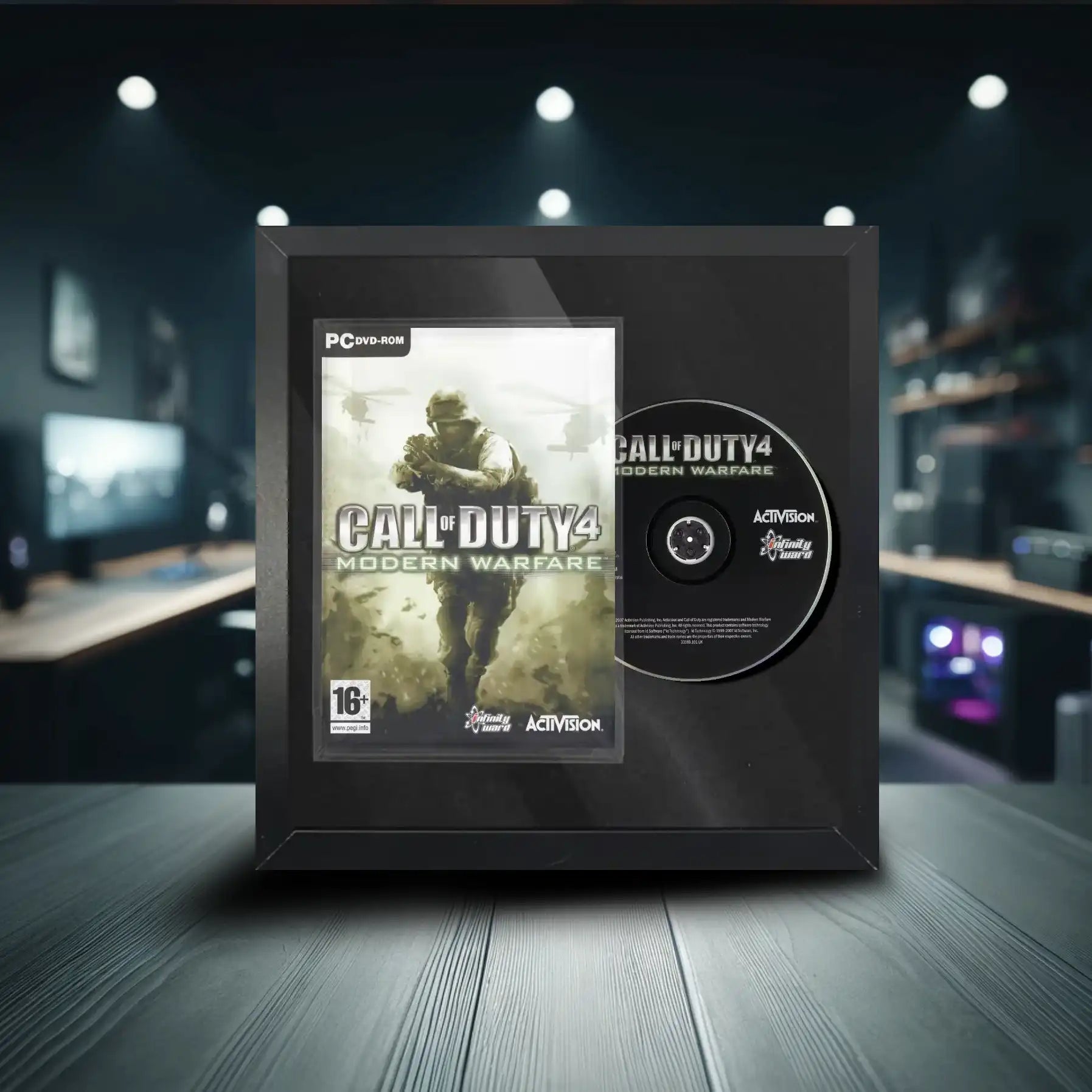 Call of Duty 4 Modern Warfare Windows PC video game inside a frame. The frame safely displays the game case and disc.