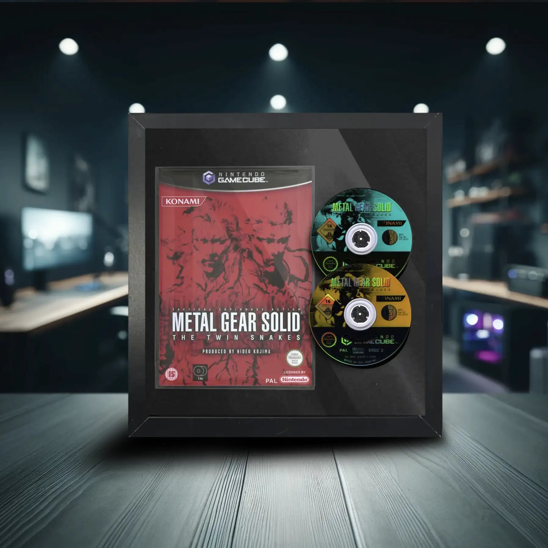 Metal gear solid gamecube video game inside a frame. This frame sits on a table inside a games room and displays the game disc and case