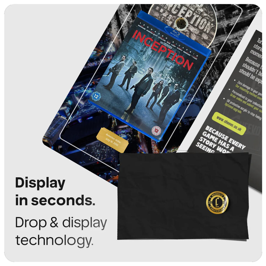 A cheevo snaplate displaying the Inception blu-ray with a personalised gold plaque, with gold logo