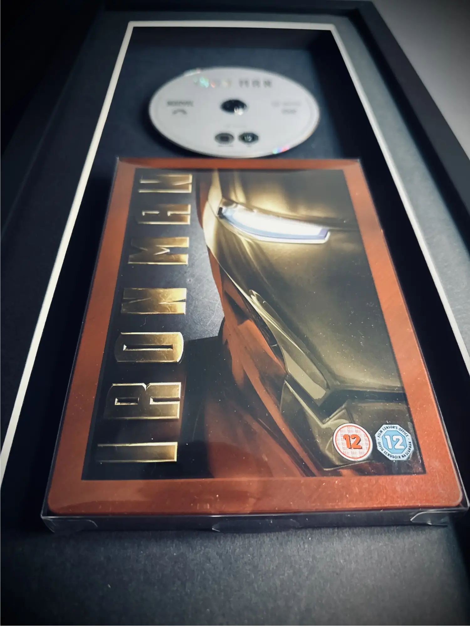 Iron Man Steelbook DVD inside a frame as a display