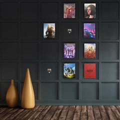 View of a large wall with multiple video game steelbooks on display. The games appear to be floating with no sign of brackets of fixing methods.