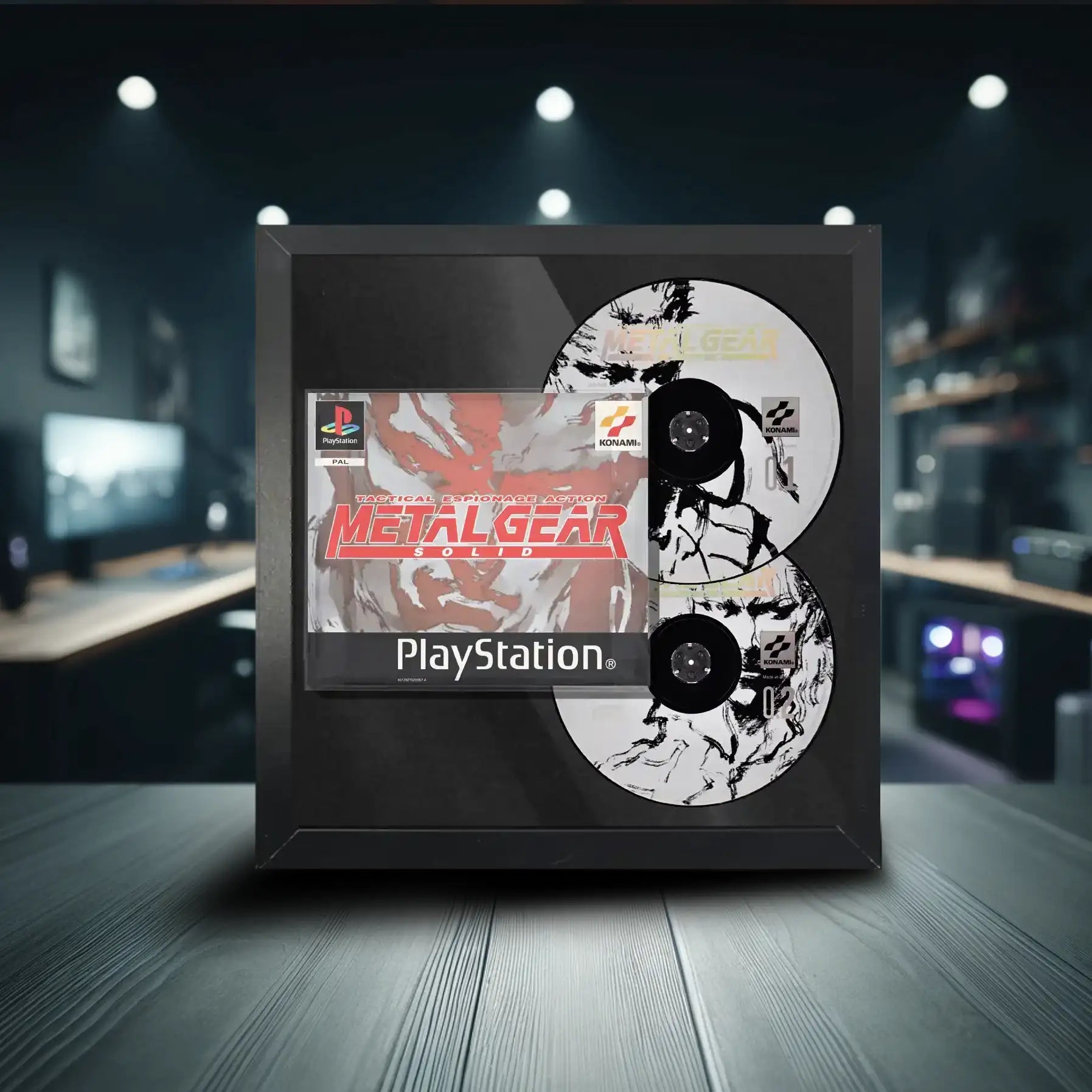 Playstation 1 Metal Gear Solid with 2 discs inside a frame made for framing video games and films