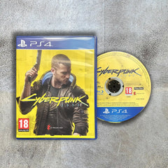 Cyberpunk 2077 game case and disc on a gray surface