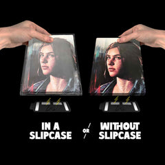 The Last of Us Part II video game steelbook being attached to a magnetic bracket both inside of a plastic slipcase and without one. They are being displayed within a frame.