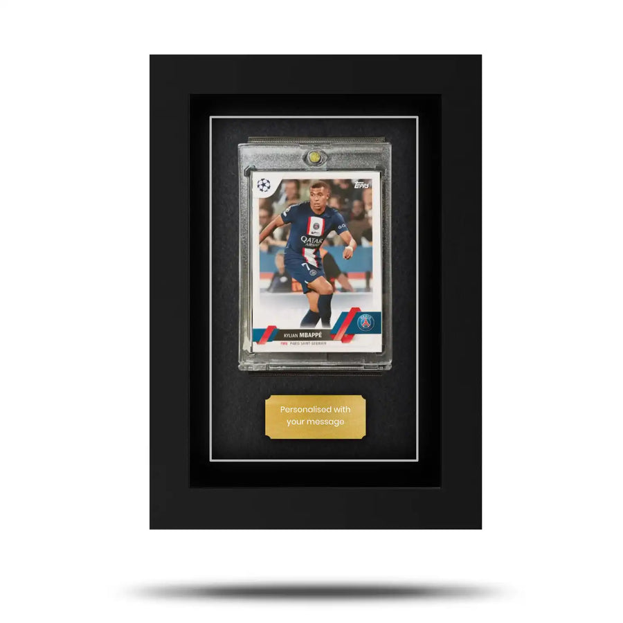 A Topps UEFA Club Competitions card displayed in a black frame with a clear protective cover.