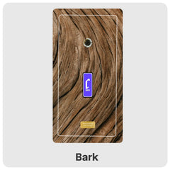 A rectangular wall plate featuring a realistic brown bark wood grain pattern, with a small blue call-style icon and the word 'Bark' below on a light gray background.