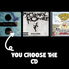 three cd's side by side