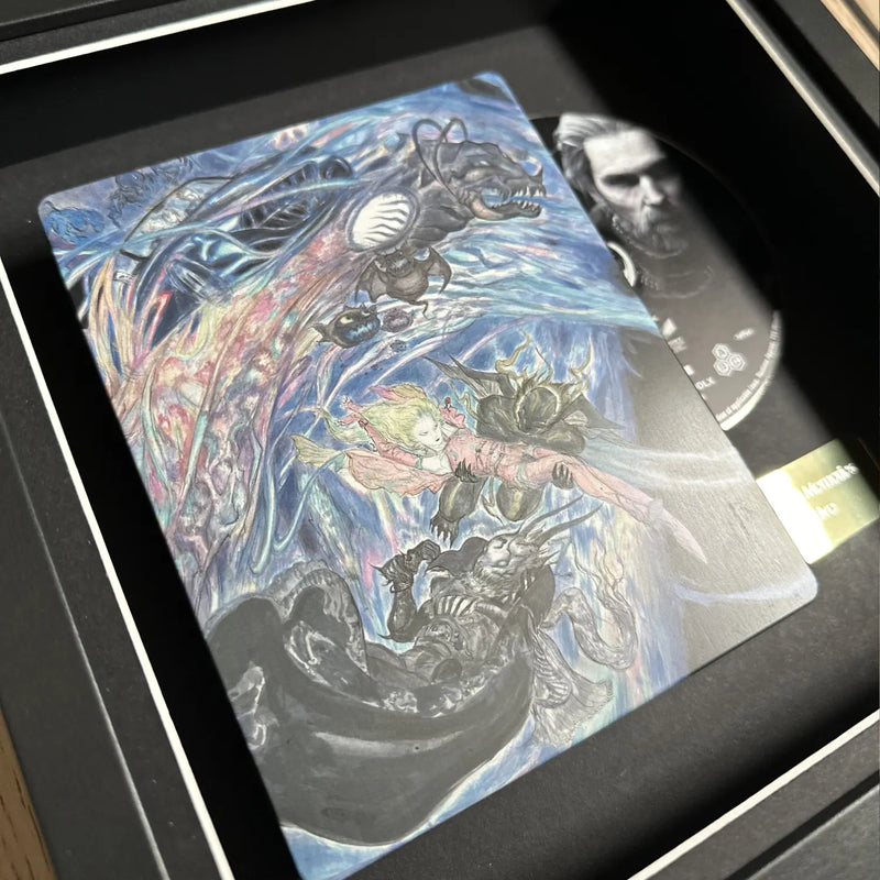 Final Fantasy steelbook inside of a picture frame from Cheevo ltd, displayed using magnets