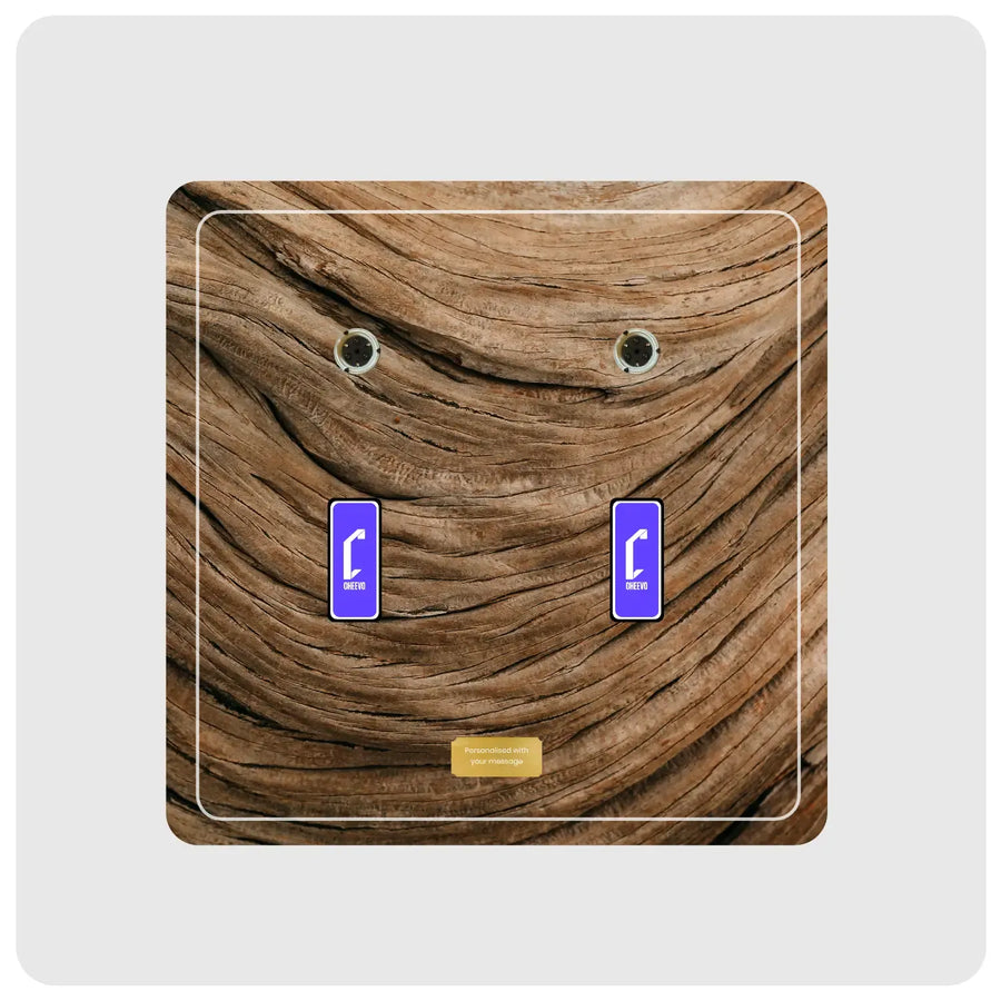 An art inspired display featuring a realistic brown wood grain pattern, with two purple rectangular Cheevo logos