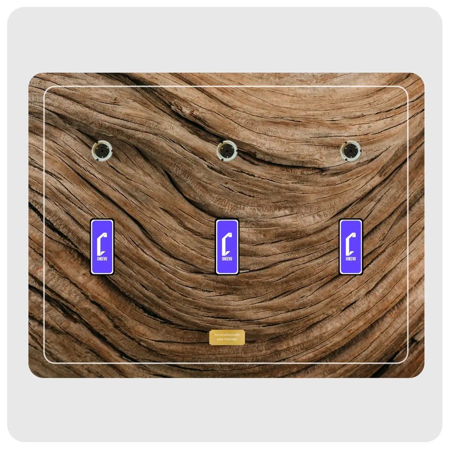 A three-placement wall plate featuring a realistic brown wood grain pattern, with three blue-purple rectangular icons and three DVD spindles