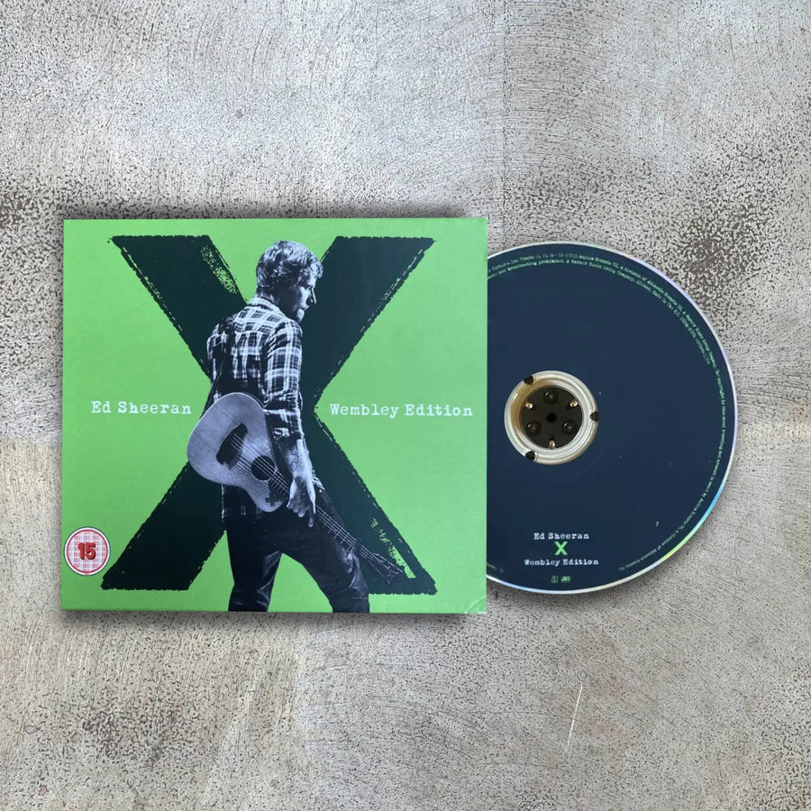 Ed Sheeran 'X' album cover and disc on a textured surface
