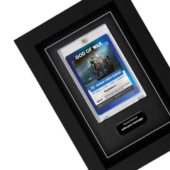 Framed Cheevo trading card inside of a frame with an engraved plaque