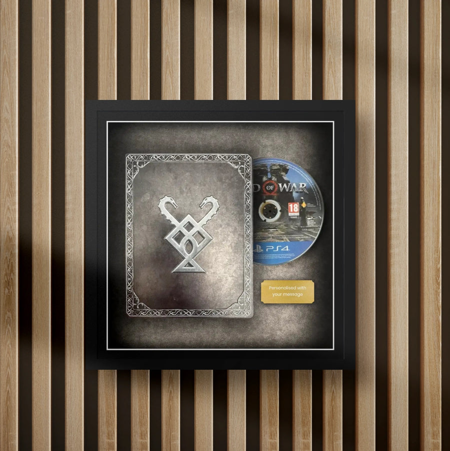 god of war steelbook display frame with full colour background on a slat wall