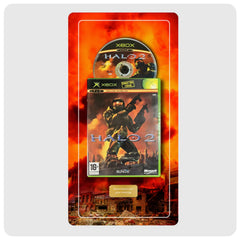 Xbox Halo 2 game case and disc presented on a custom red-orange fiery backing card with a gold personalized nameplate, centered on a light gray background.