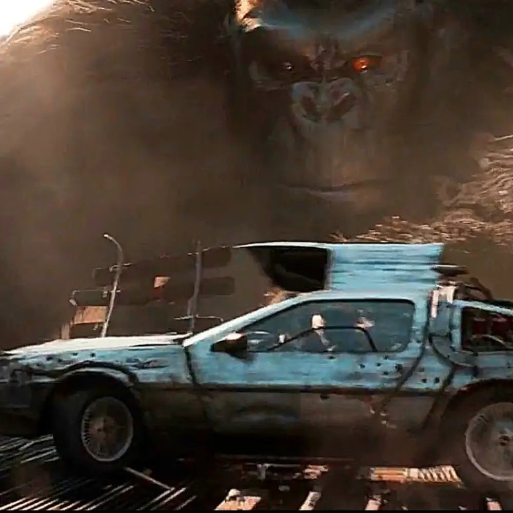 Kong character from 'Ready Player One' movie looking at the smashed virtual DeLorean vehicle