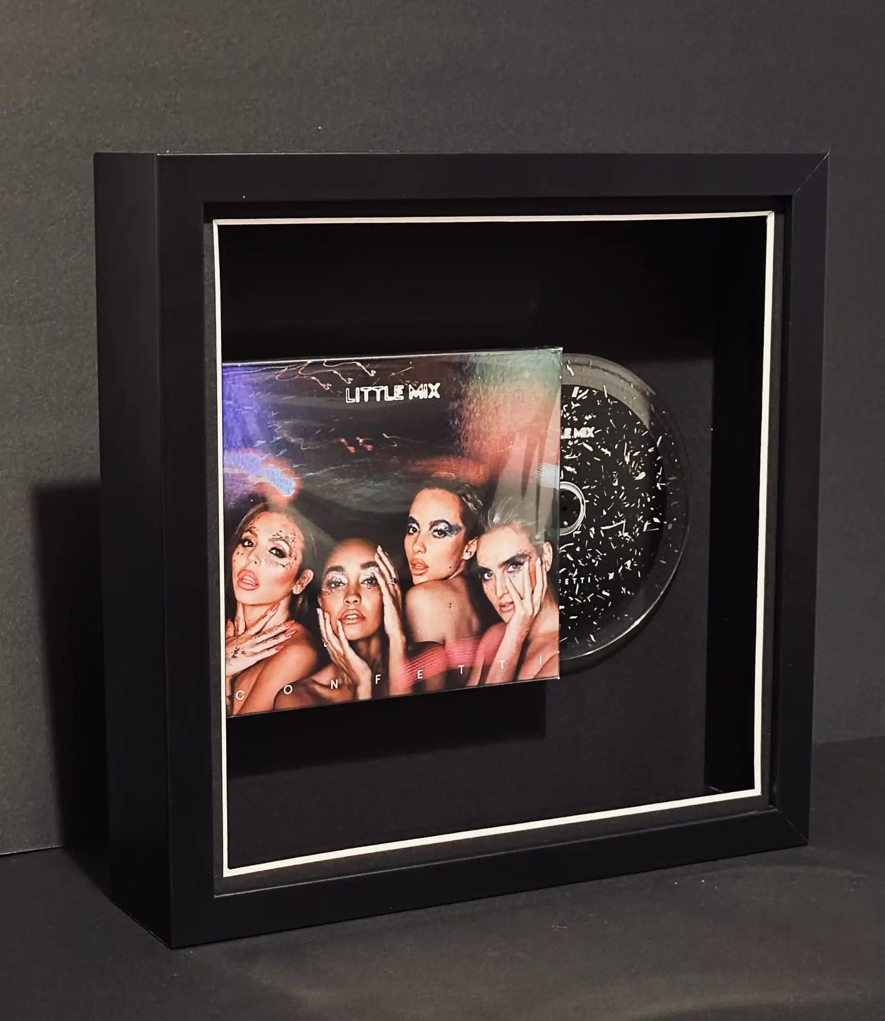 Showcase your love for Little Mix with a framed Confetti album, an iconic music memorabilia