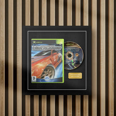 Original xbox display frame for video games on a slat wall