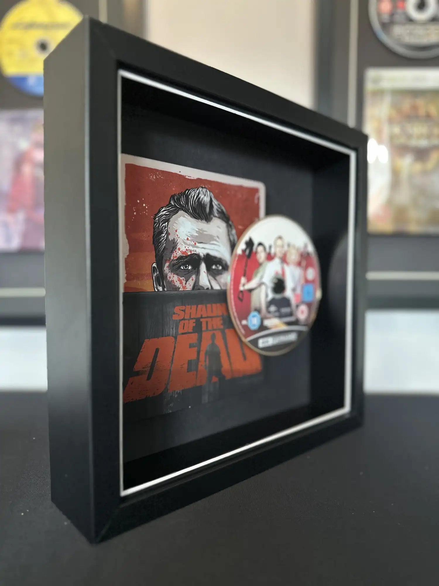 Sean of the dead 4k movie steelbook displayed in a frame