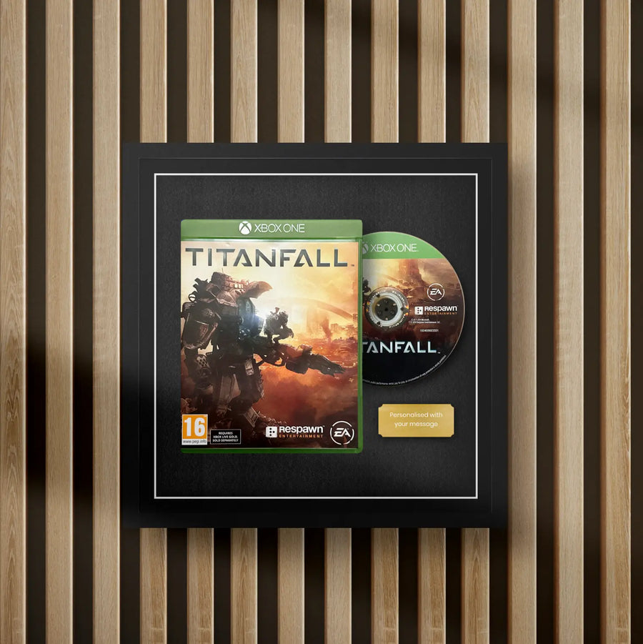 Xbox one display frame for video games on a slat wall