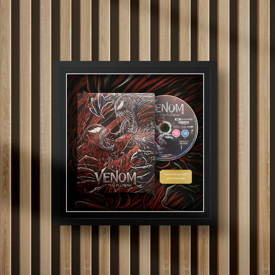 venom steelbook display frame with full colour background on a slat wall